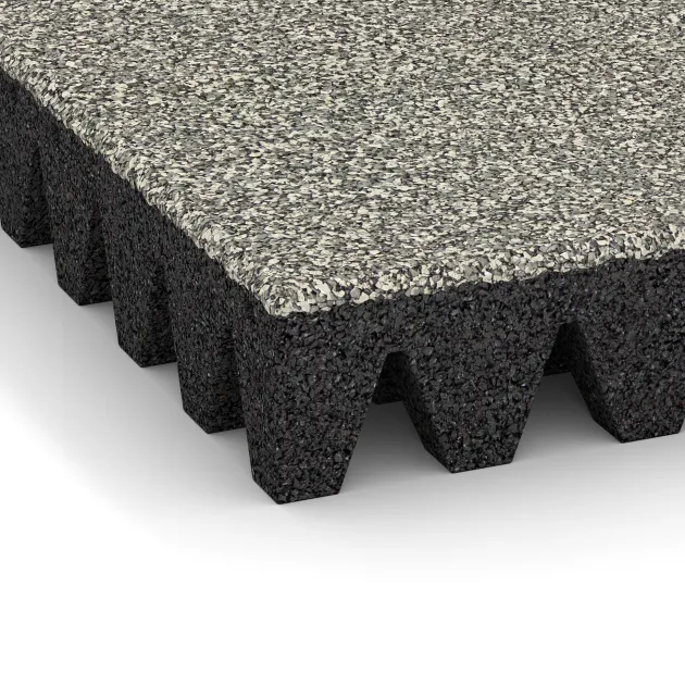 Detailaufnahme der Randausprägung von WARCO-Produkt 5368, Fallskyddsplatta för lekplats, Format 500 x 500 x 80 mm, Farbe Ljus Granit.