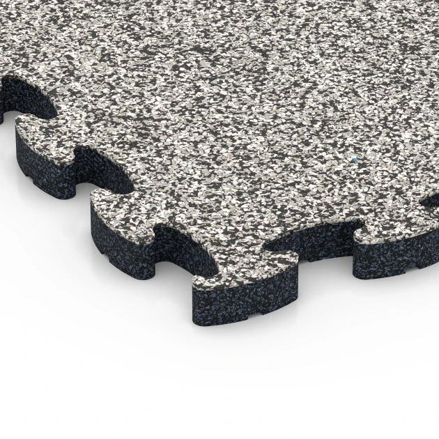 Detailaufnahme der Randausprägung von WARCO-Produkt 6932, Fallskyddsplatta pussel, Format 44,6 x 44,6 × 2,8 cm, Farbe Grå granit.