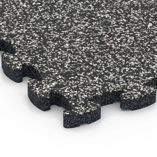 Detailaufnahme der Randausprägung von WARCO-Produkt 6814, Balkongplatta gummi, Format 28,9 x 28,9 x 1,8 cm, Farbe Mörkgrå granit.