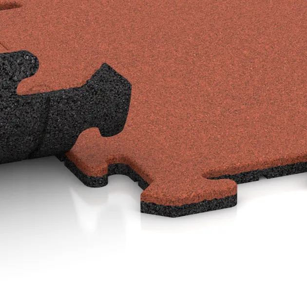 Großaufnahme vom Verbindungssystem von WARCO-Boden 6218 - Sportgolvsplatta 1,8 cm im Farbdesign Ljusröd-Orange. Abmessungen 500 x 500 x 18 mm.
