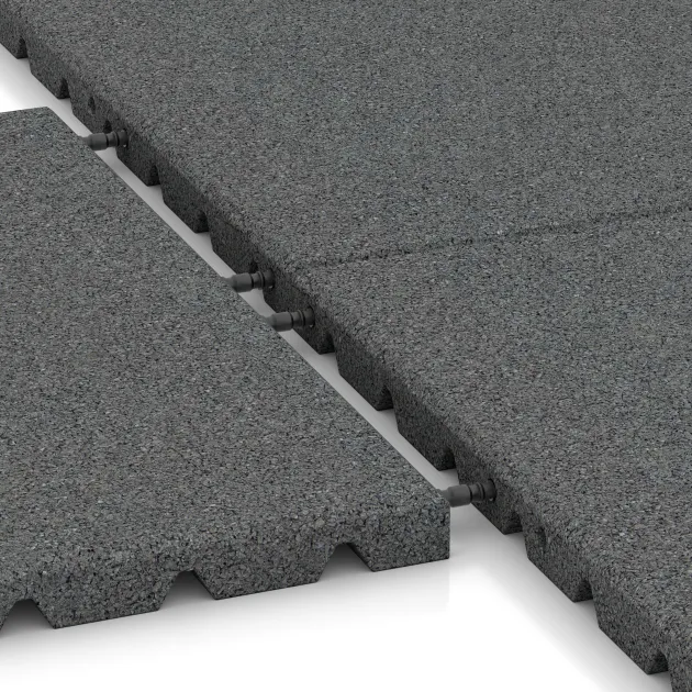 Großaufnahme vom Verbindungssystem von WARCO-Boden 5505 - Fallskyddsmatta 3 cm - EN 1177 ≤ 100 cm im Farbdesign Skiffergrå. Abmessungen 500 x 500 x 30 mm.