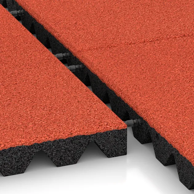 Großaufnahme vom Verbindungssystem von WARCO-Boden 0638 - Fallskyddsplatta för lekplats im Farbdesign Ljusröd-Orange. Abmessungen 500 x 500 x 45 mm.