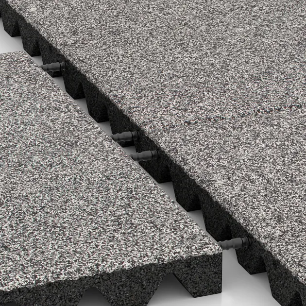 Großaufnahme vom Verbindungssystem von WARCO-Boden 4475 - Fallskyddsplatta för lekplats im Farbdesign Grå Melange. Abmessungen 500 x 500 x 45 mm.
