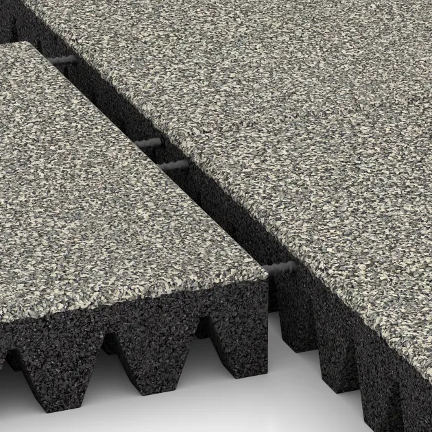 Großaufnahme vom Verbindungssystem von WARCO-Boden 5368 - Fallskyddsplatta för lekplats im Farbdesign Ljus Granit. Abmessungen 500 x 500 x 80 mm.