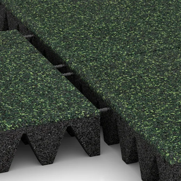 Großaufnahme vom Verbindungssystem von WARCO-Boden 5646 - Fallskyddsmattor 10 cm - EN 1177 ≤ 300 cm im Farbdesign Engelsk Gräsmatta. Abmessungen 500 x 500 x 100 mm.