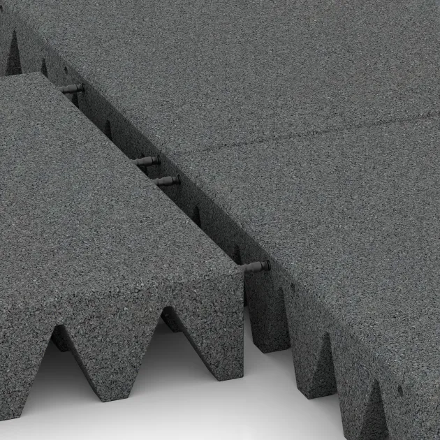 Großaufnahme vom Verbindungssystem von WARCO-Boden 0747 - Fallskyddsplatta för lekplats im Farbdesign Skiffergrå. Abmessungen 500 x 500 x 100 mm.