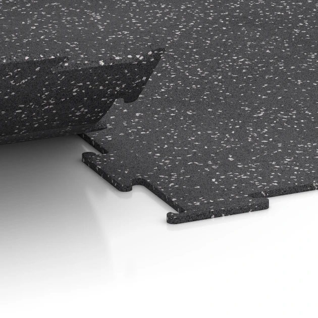 Großaufnahme vom Verbindungssystem von WARCO-Boden 6458 - Fitnessgolv Kompakt im Farbdesign Lätt Grå Spräcklig. Abmessungen 50 × 50 × 0,8 cm.