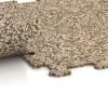 Großaufnahme vom Verbindungssystem von WARCO-Boden 0890 - Fitnessgolv Kompakt im Farbdesign Travertin. Abmessungen 485 x 485 x 8 mm | 0,235 m².