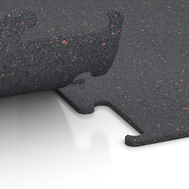 Großaufnahme vom Verbindungssystem von WARCO-Boden 3753 - Fitness Performance Elite Träningsgolv im Farbdesign Lätt Röd Sprøjtet. Abmessungen 100 x 100 x 1 cm | 1,00 m².