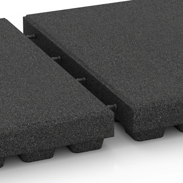 Großaufnahme vom Verbindungssystem von WARCO-Boden 6295 - Fallskyddsplattor im Farbdesign Antracit. Abmessungen 50 x 50 x 7 cm.