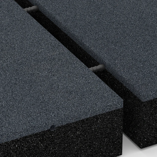 Großaufnahme vom Verbindungssystem von WARCO-Boden 6230 - Fallskyddsplattor im Farbdesign Skiffergrå. Abmessungen 50 x 50 x 11 cm.