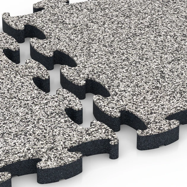 Großaufnahme vom Verbindungssystem von WARCO-Boden 6878 - Fitness Max gymgolv im Farbdesign Grå granit. Abmessungen 44,6 x 44,6 × 2,8 cm.