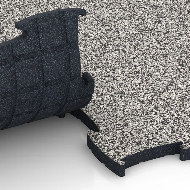 Großaufnahme vom Verbindungssystem von WARCO-Boden 6887 - Fitness Max gymgolv im Farbdesign Grå granit. Abmessungen 97,1 x 97,1 x 2,8 cm.